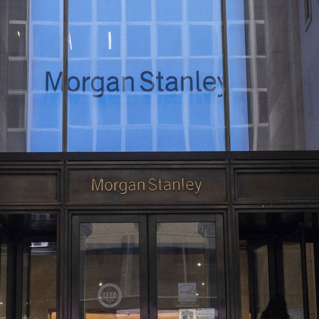 Morgan Stanley building in New York with a blue lit-up sign